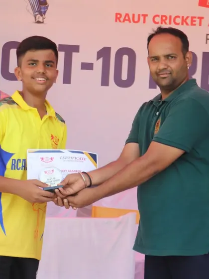 Another player from the RCA Super Kings receiving his award.