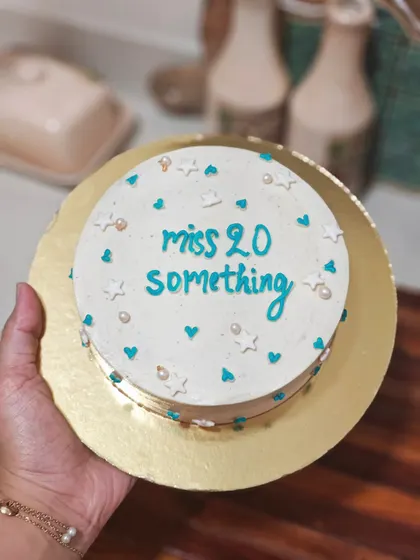A "miss 20 something" bento cake for a birthday. The simple writing and scattered star and heart sprinkles make it a really cute and personal gift.