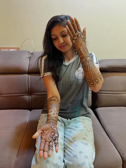 A different angle, showing the design on one palm and the back of the other hand. The patterns are beautifully balanced.