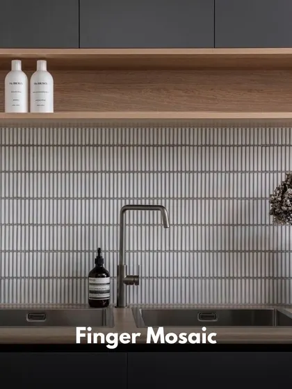 Finger mosaic tiles create a subtle, textured look. Their slim, vertical shape adds a sense of height and a clean, contemporary feel to a kitchen backsplash.