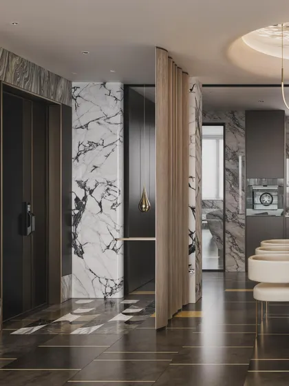 This view shows the seamless flow from the dining area to the rest of the open-plan penthouse, with marble and dark wood creating a cohesive, luxurious feel.