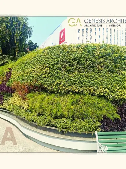This large, sculpted green wall serves as a living art installation for a public space. It demonstrates our ability to execute complex vertical gardens that make a bold statement in commercial and community projects.