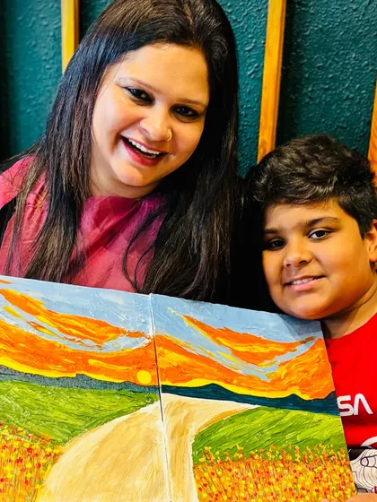A beautiful mother-son duo showing off the textured landscape they created together. My workshops are a great way for families to bond and make lasting memories.