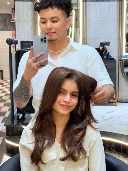 A beautiful hair color can make you look and feel better. This warm, light brown is radiant and perfectly complements her features.