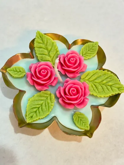 A duplicate of the beautiful lotus urli floating candle.