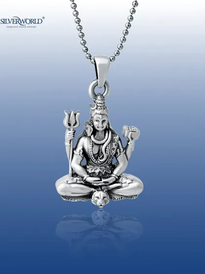 This intricately detailed Lord Shiva pendant is a centerpiece of our spiritual collection. Carved from solid 92.5 silver with an oxidized finish to highlight the details, it comes ready to wear on a classic ball chain.