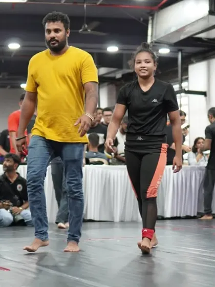 This is Sheza Shariff, our 14-year-old prodigy. She put on a clinical, technical show to finish her fight quickly. People have no idea what we are building in our garage.