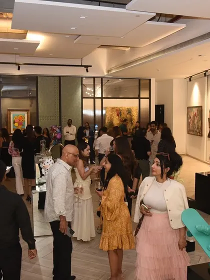 A wide shot of the opening night for our 'For The Love of Art' exhibition. The image captures the electric atmosphere as guests mingle among the bold colors and iconic inspirations of our pop art collection.