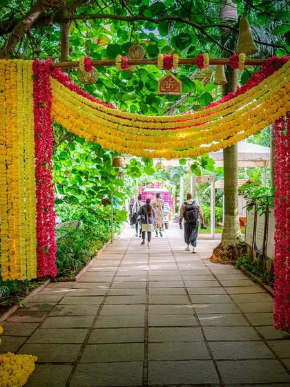 The grand floral entrance arch we created, welcoming guests into a world of celebration and color.