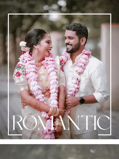 A romantic and happy portrait of a Kerala Christian couple, their joy evident in their smiles as they pose together after their wedding.