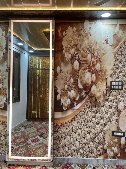 A finished project showcasing a beautiful 3D wallpaper in a bedroom, complete with a custom-lit mirror. This shows how different elements can come together for a complete look.