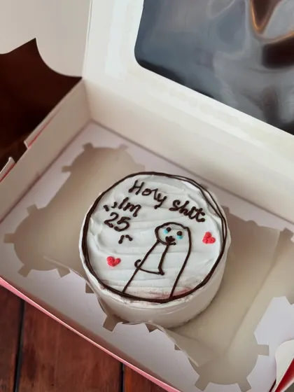 A funny take on turning 25, this bento cake exclaims "Holy shit I'm 25" with a surprised stick figure character. It's a perfect cake for a milestone birthday with a sense of humor.