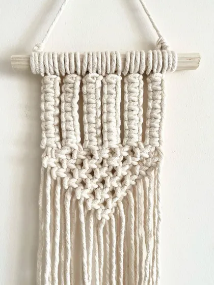 This is the second design from the mini wall hanging set. I used different macrame knots to create a lovely textured pattern.