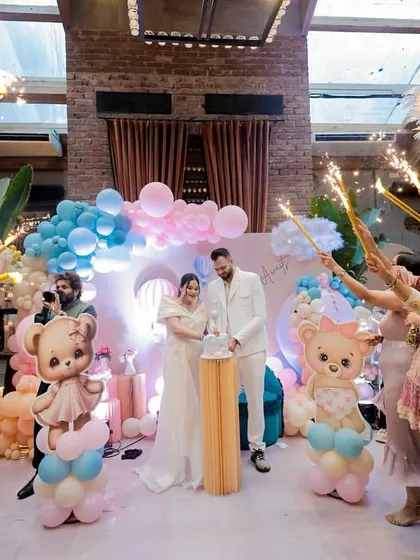 The cake cutting moment, made even more special with a tunnel of sparklers held by loved ones.