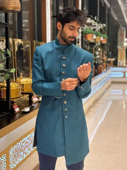 Trying to fix the buttons but still looking sharp! Love dressing up for wedding season.