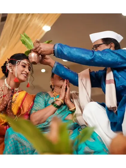 The parents bless the bride during the pre-wedding rituals, a moment full of emotion and tradition.
