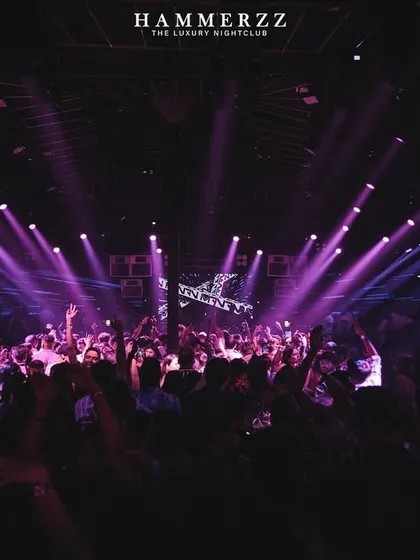 The entire dance floor at Hammerzz luxury nightclub is united under the lights. This is the scale of the parties I command.