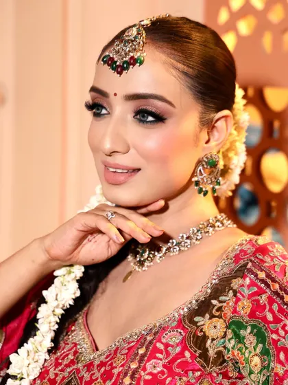 A happy smile from my beautiful bride. Her flawless makeup and traditional jewelry make for a timeless wedding day look.