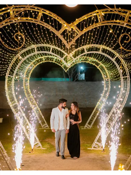 A magical night shoot setup for Siddharth and Simran. We create these elaborate arrangements with heart-shaped light tunnels and cold-fire sparklers to add a touch of glamour and create truly show-stopping pre-wedding photos.