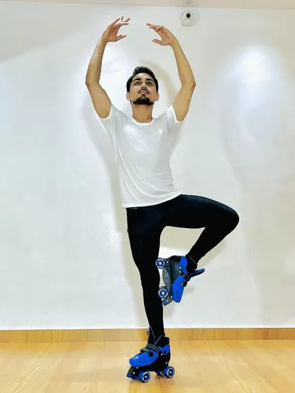 A duplicate of the featured image 94, showing a ballet pose on skates.