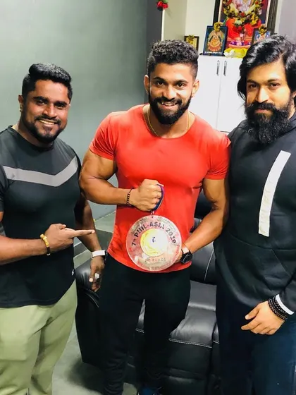 With my uncle and Yash, holding my Phil-Asia 2019 medal. Their support is invaluable, and it's a privilege to share my achievements with them.