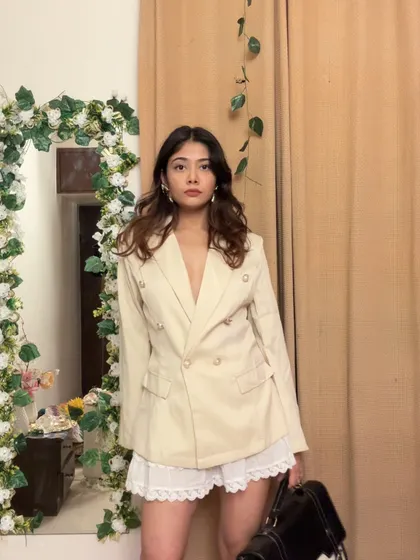 Who says workwear has to be boring? I paired this sharp, double-breasted blazer with a delicate lace skirt for a look that’s professional yet full of personality.
