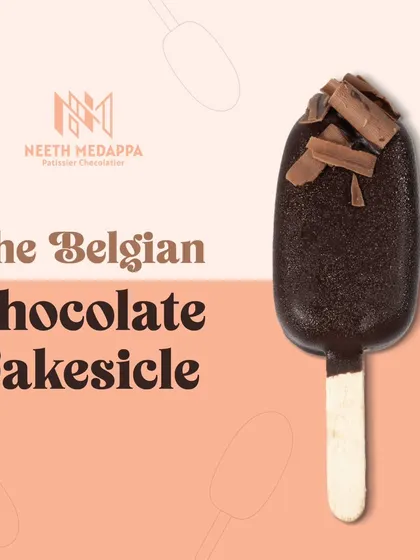 This is my Belgian Chocolate Cakesicle. It's the ultimate treat, with a crunchy Belgian chocolate shell giving way to a moist cake and creamy frosting inside.