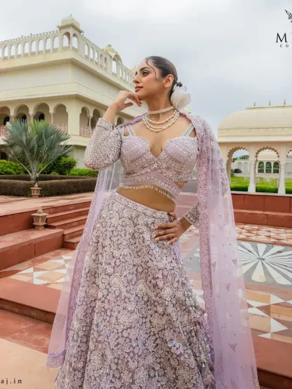 A full view of the pastel lilac lehenga, showcasing its romantic charm and regal craftsmanship, designed for the bride who embraces elegance with confidence.
