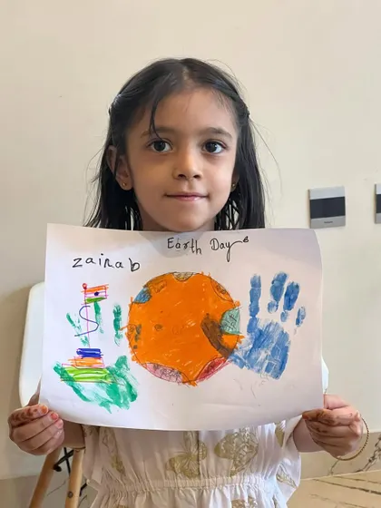 Another beautiful and unique interpretation of our Earth Day theme. The handprints are a lovely personal touch.