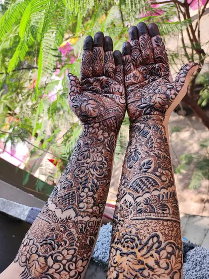 This shot, taken outdoors, shows how the natural light highlights the rich color of the organic henna paste I use.