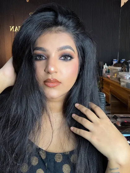 A confident portrait of me wearing the classic smokey eye look.