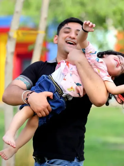 Capturing pure, unfiltered joy during an outdoor family session. I encourage playful moments like this to get genuine smiles and create memories of your family just being themselves.