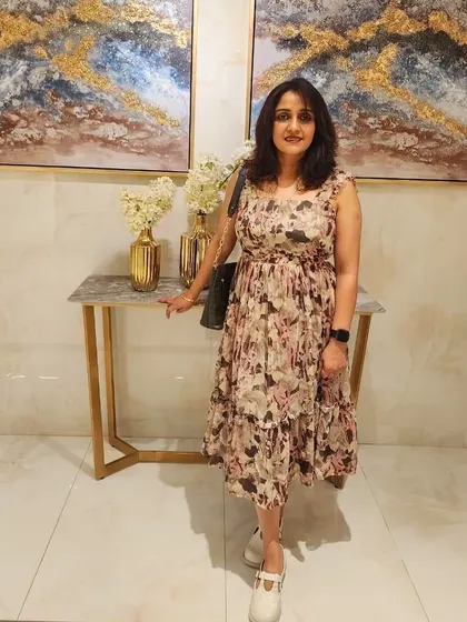Our client looking absolutely ravishing in this floral tiered dress for her dinner getaway. It’s so wonderful to see my designs become a part of your special moments.