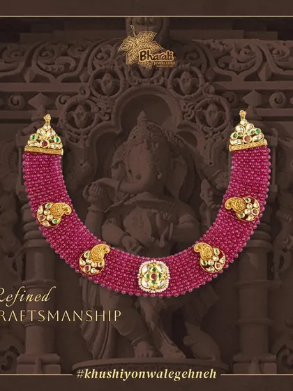 Elevate your look with this exquisite necklace, featuring a stunning contrast of royal Rani pink beadwork and intricate Tukkar Kundan work. The design, with its elephant motifs, is crafted to fit seamlessly and flatter every neck.