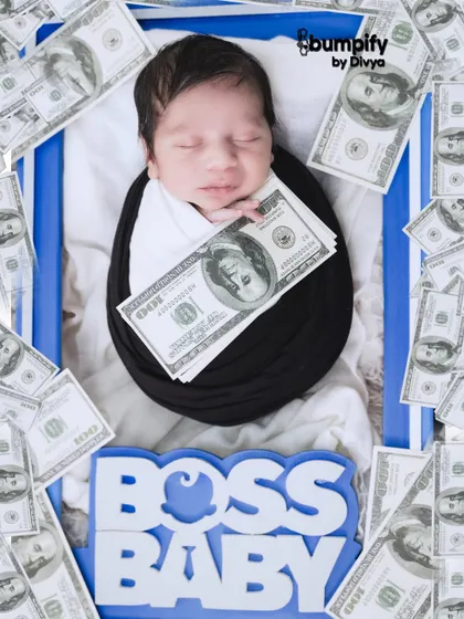 "Chhota packet, bada business." This fun 'Boss Baby' theme is perfect for newborns with big personalities, complete with a suit-like wrap and a prop full of money.