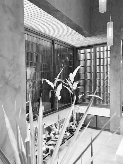 Another monochrome view that highlights the depth and layers of the courtyard space at 'The Mantle'.