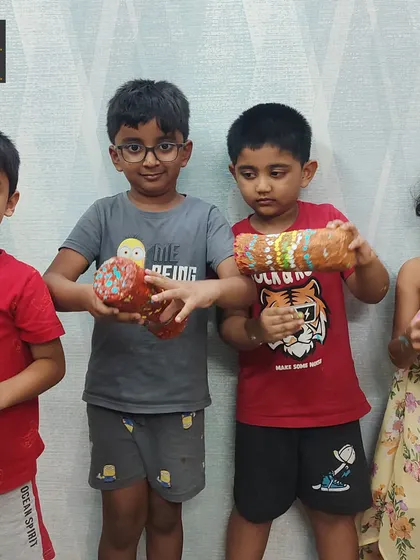 Our little artists proudly holding the rain sticks they made. Inspired by Aboriginal culture, these instruments mimic the sound of rain and were a blast to create and decorate.