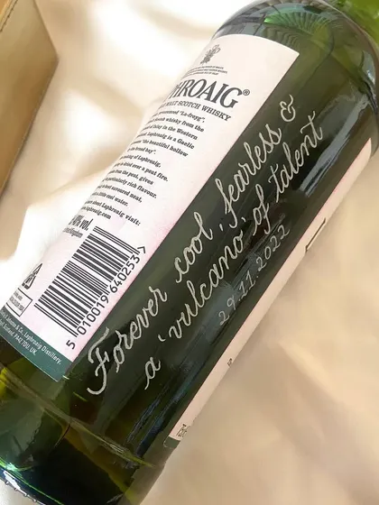 I love when my work pushes me out of my comfort zone. I engraved a name in Bengali on this gorgeous green Laphroaig bottle, along with a powerful quote. It's a joy to work with different languages and scripts.