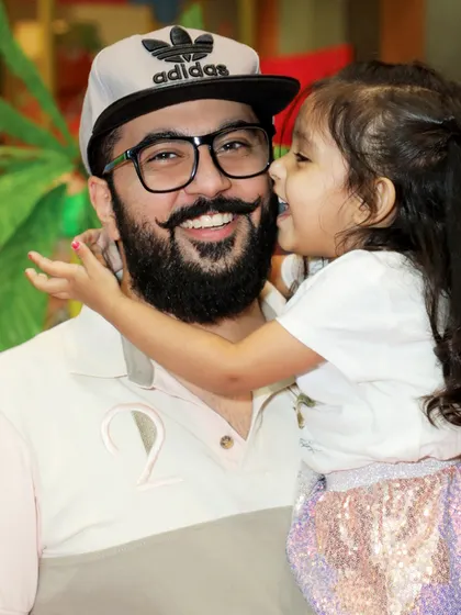 A sweet father-daughter moment captured during the party. My goal is to create a backdrop for families to make and cherish these precious memories.