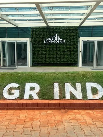 For the Saint-Gobain corporate office, I created this unique branding feature using grass and custom-cut alphabet stones.