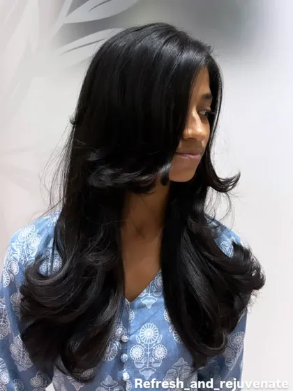 Another angle of this gorgeous layered cut, showing how the layers are feathered to create a soft, flowing look.