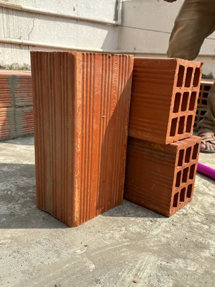 Getting started on a terrace makeover at my own home. The first step is bringing in the materials, like these hollow clay bricks, which are great for construction and insulation.