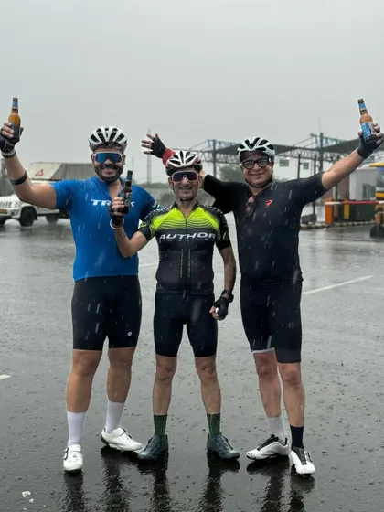 Celebrating a birthday with beers in the rain after a ride. That's the DC spirit!