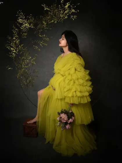By adding a prop with golden foliage, I can transform a simple setup into an artistic composition with a touch of magic.
