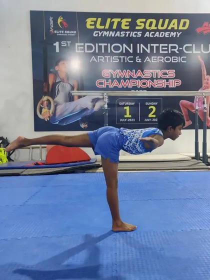 This young boy shows excellent form and balance in his arabesque. We train both boys and girls in these essential artistic gymnastics elements.