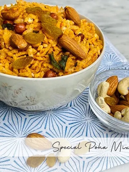 My Special Poha Mixture is a delightful trail mix, loaded with flattened rice, almonds, cashews, and raisins. It's a perfect balance of sweet and savory flavors.