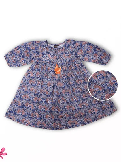 This floral dress with balloon sleeves is another one of my summer favorites. The print is delicate and the style is classic, making it a timeless piece for your girl's wardrobe.