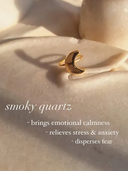 A close-up of the Smoky Quartz Luna Ring. This stone is wonderful for bringing emotional calmness, relieving stress and anxiety, and dispersing fear.