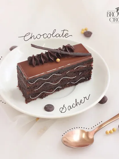 Our take on the Viennese classic, the Chocolate Sacher pastry. It has dense chocolate sponge layers with a hint of apricot, all coated in a glossy chocolate glaze.