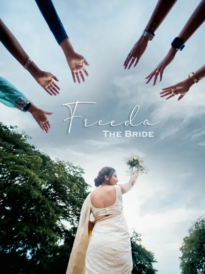 A creative shot of the bride, with hands reaching towards her, symbolizing the love and support of her friends and family.
